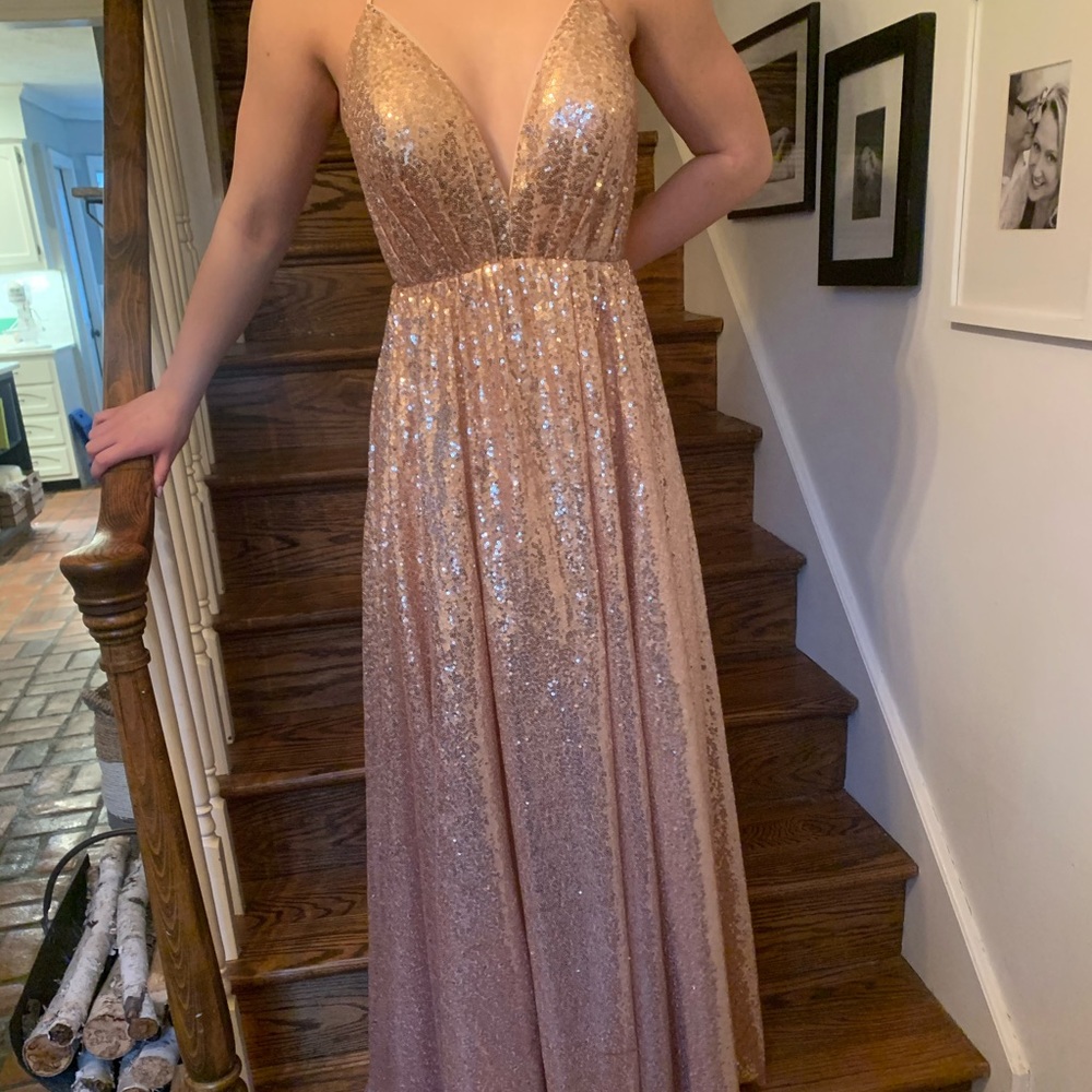 Beautiful blush sequined floor length formal gown.